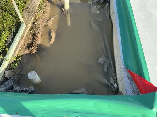 Water pooling at slab edge