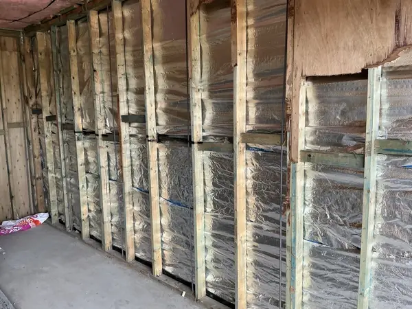 Wall framing and sarking