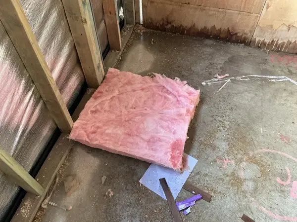 Insulation debris on floor