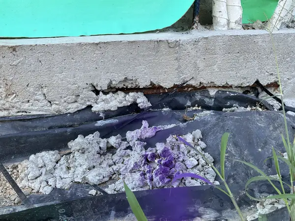 Slab edge defect with exposed reinforcement steel - NCC compliance breach