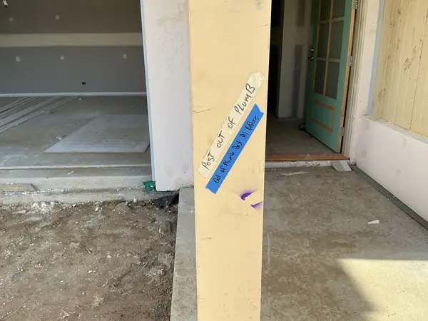 Post out of plumb marked at frame stage - builder accountability inspection
