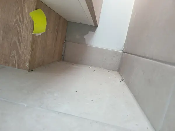 Finish defect showing corner gap - quality standards inspection