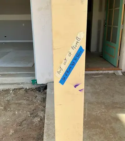 Post out of plumb marked at frame stage - builder accountability inspection — VG Inspect