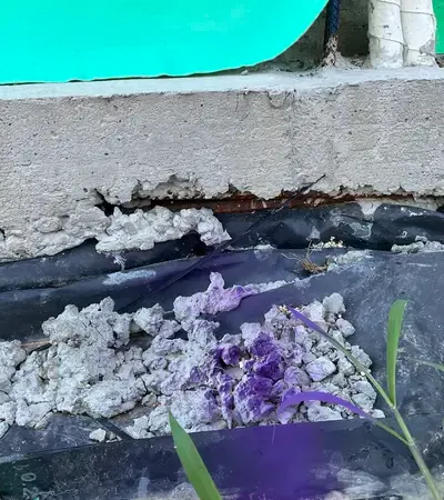 Slab edge defect with exposed reinforcement steel - NCC compliance breach — VG Inspect