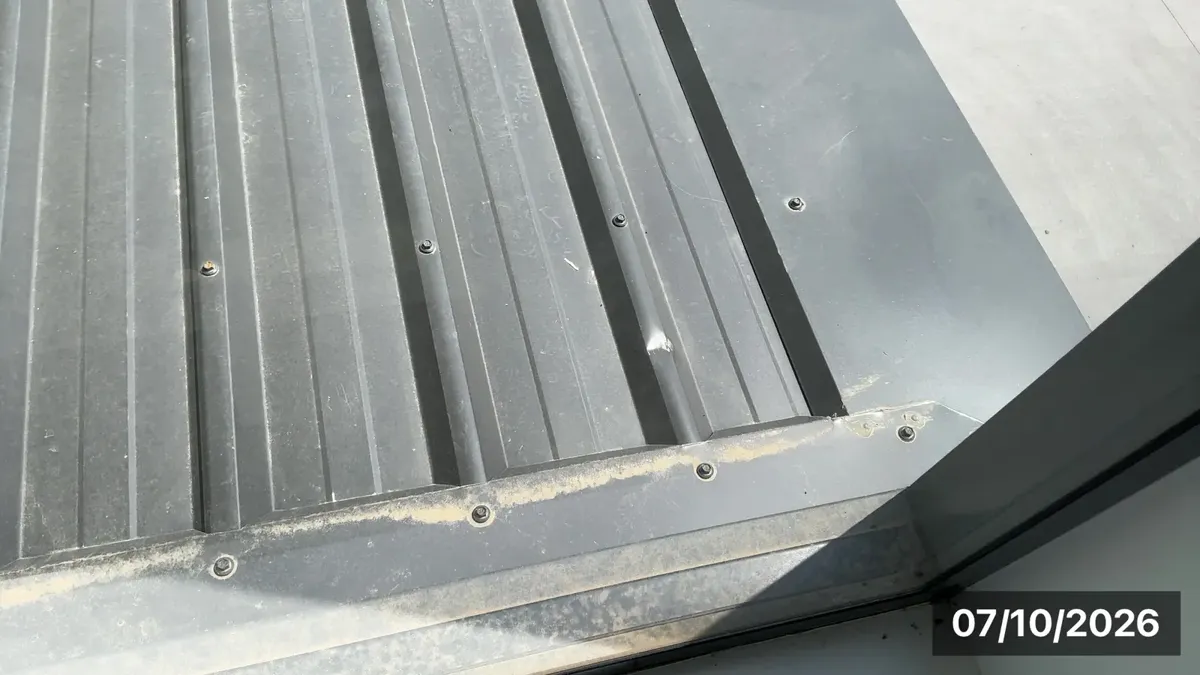 Dented roof sheets, scratched gutters and fascias