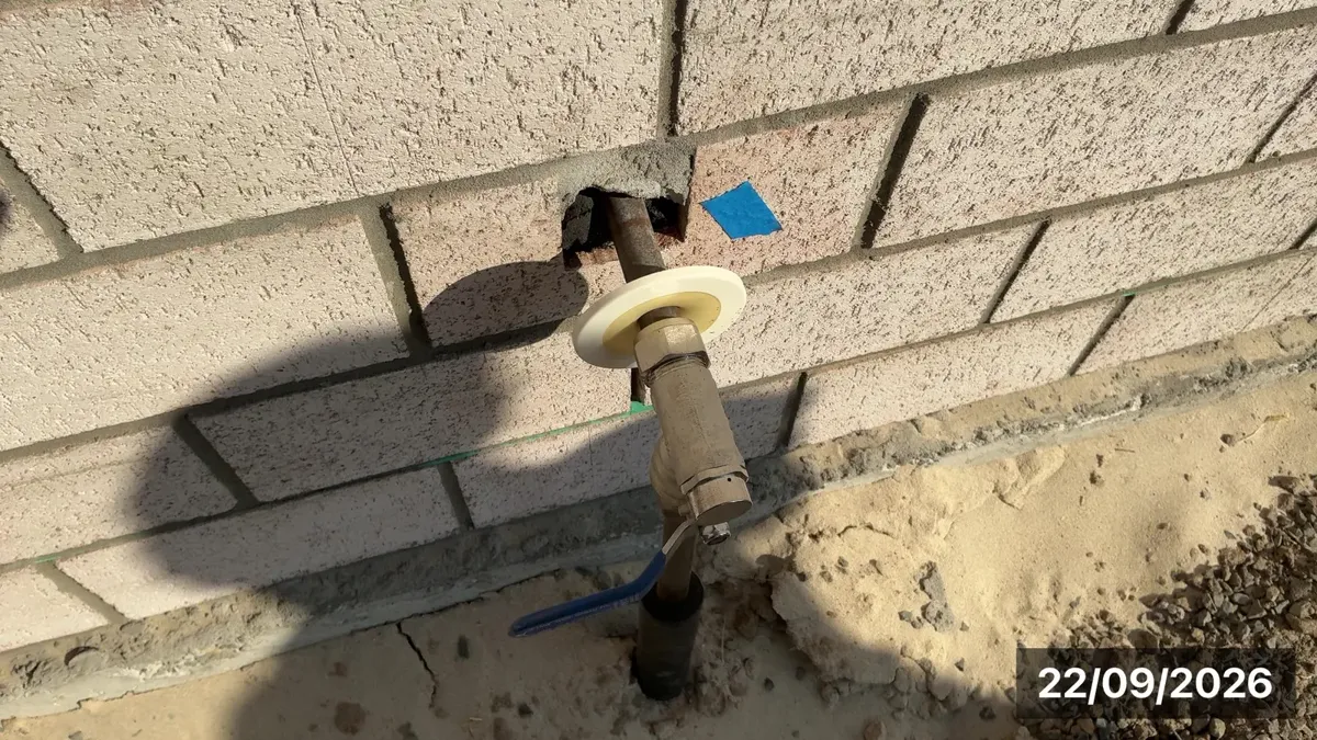 Water main through an unsealed hole, pipe not clamped